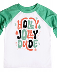 Green and white raglan shirt featuring the fun holiday phrase 'Holly Jolly Dude' in bold orange, green, and black letters, surrounded by festive elements like snowflakes, Christmas trees, and stars.